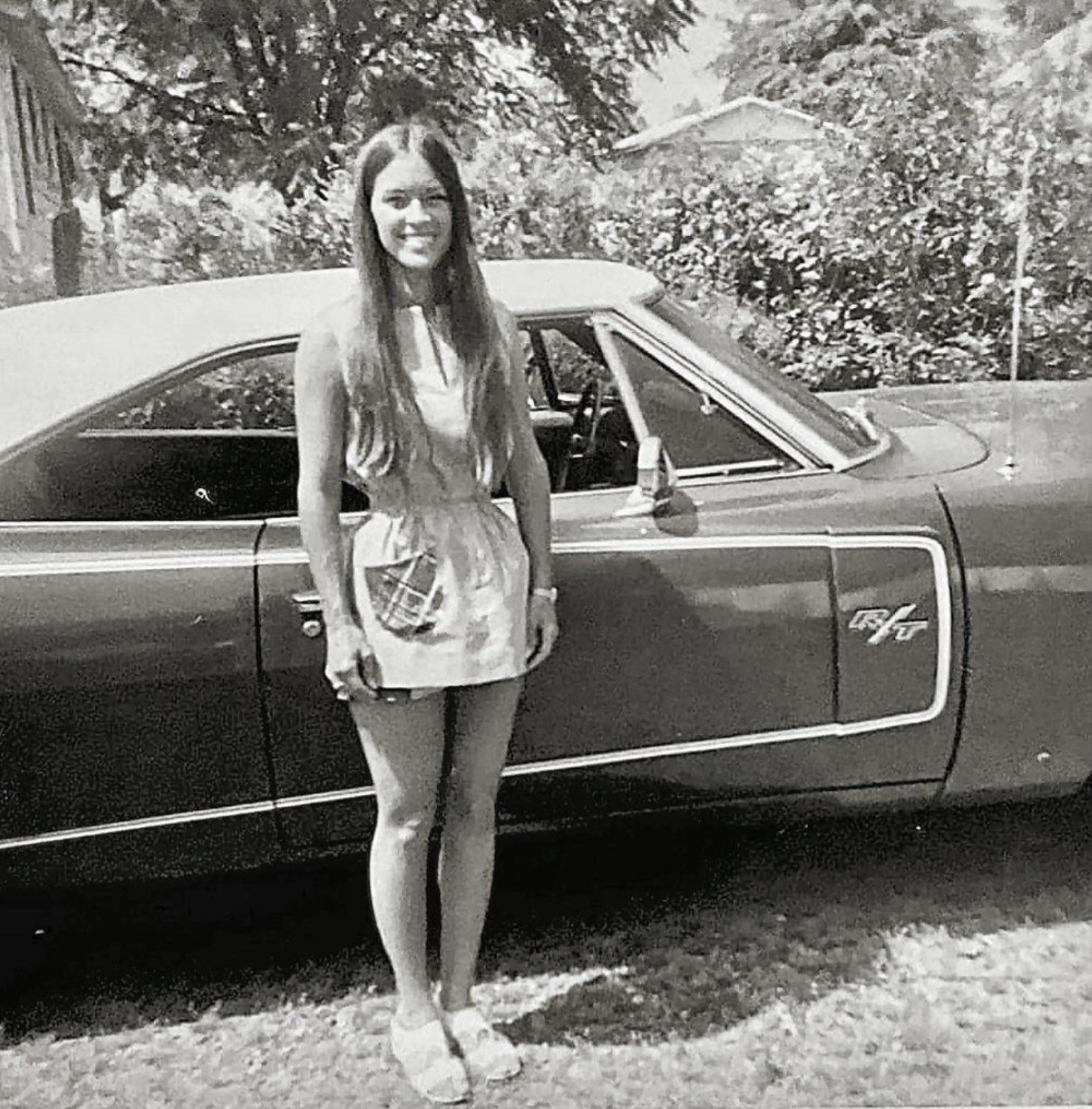 The girl next door with a 1970 Dodge Charger R/T. 